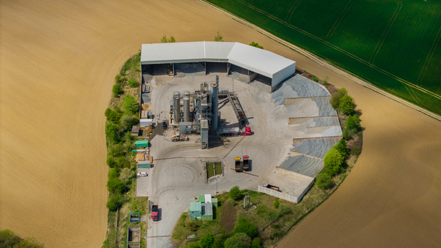 Aerial view of Zipotin industrial facility with silos and trucks surrounded by agricultural fields Gruna Pardubicky kraj Czechia. Aerial view of Zipotin industrial facility with silos and trucks surrounded by agricultural fields Gruna Pardubicky kraj Czechia.