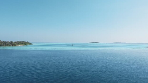 Aerial view of tropical islands and turquoise sea Maldives. Aerial view of tropical islands and turquoise sea Maldives.