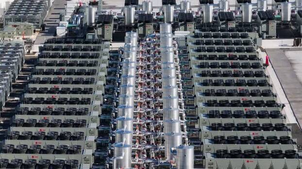 Aerial view of data center cooling systems in United States. Aerial view of data center cooling systems in United States.