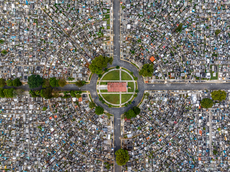 Aerial view of Maximo Gomez National Cemetery with its distinct circular layout dense rows of graves and central plaza in Santo Domingo Distrito Nacional Dominican Republic. Aerial view of Maximo Gomez National Cemetery with its distinct circular layout dense rows of graves and central plaza in Santo Domingo Distrito Nacional Dominican Republic.