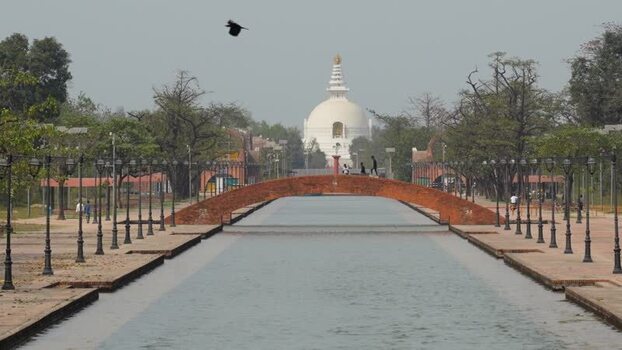 View of the World Peace Pagoda and central canal in Lumbini Nepal.