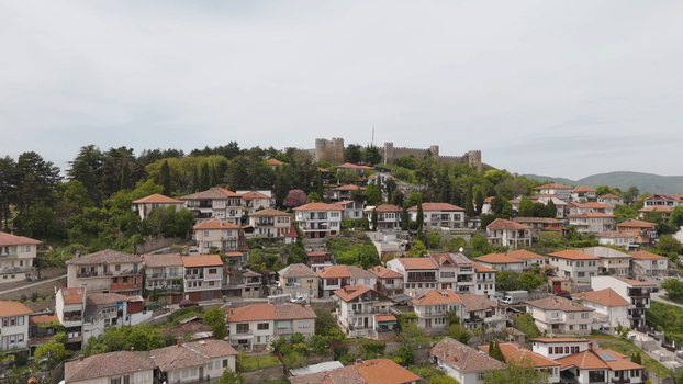 Aerial view of Samuel s Fortress overlooking the historic town of Ohrid with its traditional houses and red tiled roofs in Ohrid Municipality of Ohrid North Macedonia. Aerial view of Samuel s Fortress overlooking the historic town of Ohrid with its traditional houses and red tiled roofs in Ohrid Municipality of Ohrid North Macedonia.