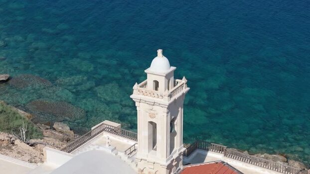 Aerial view of church bell tower by the sea in Northern Cyprus.