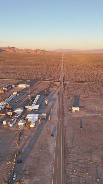Aerial view of Roy s Motel and Cafe on Route 66 in the desert United States.