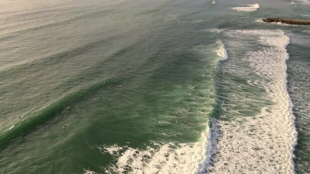 Aerial view of surfers at Praia da Mata Portugal. Aerial view of surfers at Praia da Mata Portugal.