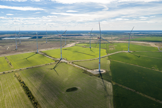 Aerial view of Windpark Forst Briesnig II situated on recultivated land of the former Janschwalde open pit mine with wind turbines in green fields in Forst Brandenburg Germany. Aerial view of Windpark Forst Briesnig II situated on recultivated land of the former Janschwalde open pit mine with wind turbines in green fields in Forst Brandenburg Germany.