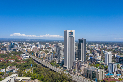 Aerial view of the Westlands district in Nairobi featuring modern skyscrapers the I Love NBO building and the elevated expressway Nairobi Nairobi County Kenya. Aerial view of the Westlands district in Nairobi featuring modern skyscrapers the I Love NBO building and the elevated expressway Nairobi Nairobi County Kenya.