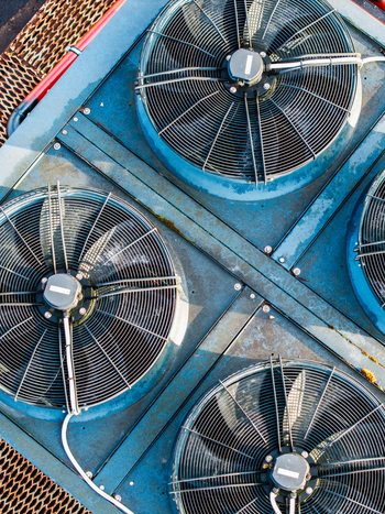 Aerial view of industrial cooling fans installed on a rooftop in Riga Latvia. Aerial view of industrial cooling fans installed on a rooftop in Riga Latvia.