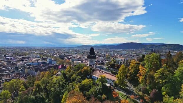 Aerial view of Schlossberg and the clock tower in Graz Austria.