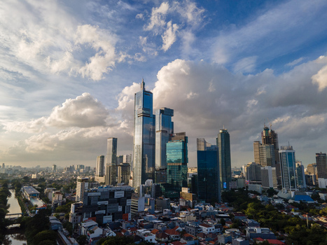 South Jakarta Indonesia 10 January 2026 Aerial view of modern skyscrapers and the Gama Tower under a dramatic cloudy sky in the Kuningan business district. South Jakarta Indonesia 10 January 2026 Aerial view of modern skyscrapers and the Gama Tower under a dramatic cloudy sky in the Kuningan business district.