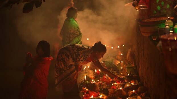 View of people performing a religious ritual with candles Bangladesh. View of people performing a religious ritual with candles Bangladesh.