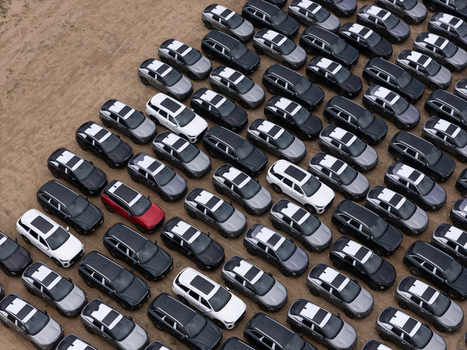 Gdansk Polska 24 September 2026 Aerial view of new Chinese cars parked in an organized lot with rows of vehicles on a dirt surface. Gdansk Polska 24 September 2026 Aerial view of new Chinese cars parked in an organized lot with rows of vehicles on a dirt surface.