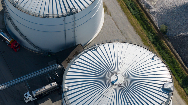 Aerial view of the Cosun Beet Company industrial site featuring large storage tanks industrial silos and trucks parked on the premises in Groningen Groningen Netherlands. Aerial view of the Cosun Beet Company industrial site featuring large storage tanks industrial silos and trucks parked on the premises in Groningen Groningen Netherlands.