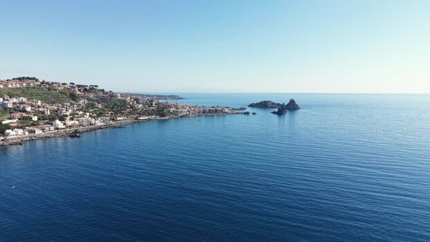 Aerial view of Islands of the Cyclops and Aci Castello Italy.