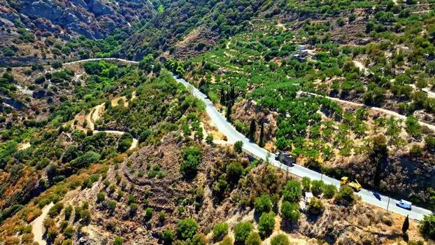 Aerial view of winding road in Crete Greece.