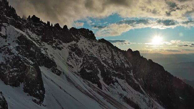 Aerial view of Dolomite Mountains at sunset Italy.