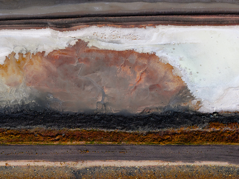 Aerial view of wastewater evaporation ponds by the Great Salt Lake featuring crystallized salt deposits and crusted earth textures in Ogden Utah United States. Aerial view of wastewater evaporation ponds by the Great Salt Lake featuring crystallized salt deposits and crusted earth textures in Ogden Utah United States.