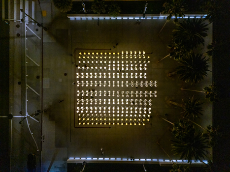 Los Angeles California United States 16 September 2026 Aerial view of Urban Light installation at night with rows of glowing vintage street lamps in a grid palm trees and city streets. Los Angeles California United States 16 September 2026 Aerial view of Urban Light installation at night with rows of glowing vintage street lamps in a grid palm trees and city streets.