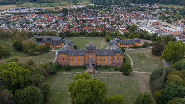 Aerial view of Schloss Lowenstein surrounded by lush green parkland and the town of Kleinheubach in the background Kleinheubach Bayern Germany. Aerial view of Schloss Lowenstein surrounded by lush green parkland and the town of Kleinheubach in the background Kleinheubach Bayern Germany.