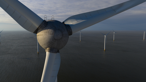 Aerial view of a wind turbine hub and blades at an offshore wind farm over the sea Espel Flevoland Netherlands. Aerial view of a wind turbine hub and blades at an offshore wind farm over the sea Espel Flevoland Netherlands.