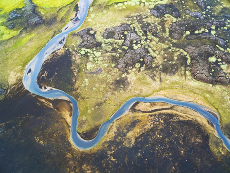 Abstract aerial view of water stream through lava field Skjaldbreidarhraun Kaldidalur highlands of Iceland.