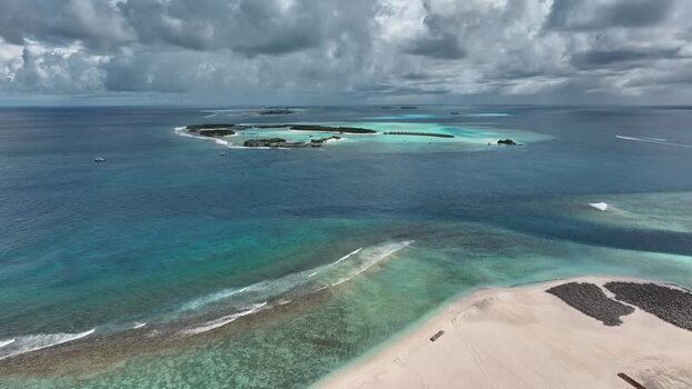 Aerial view of Gulhi island and resort Maldives. Aerial view of Gulhi island and resort Maldives.