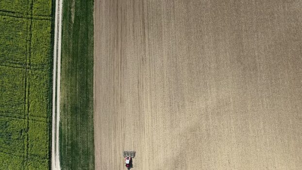 Aerial view of tractor in field France.