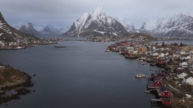 Aerial view of Lofoten islands and red cabins in Norway.