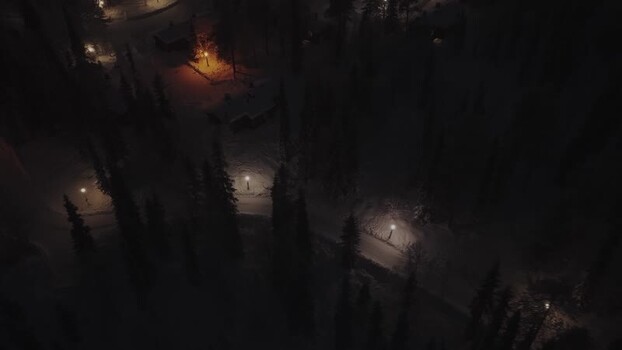 Aerial view of Luosto forest paths at night Finland.