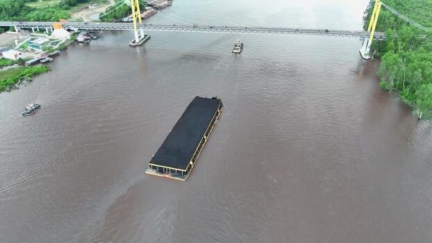 Aerial view of coal barge on Barito River Indonesia.