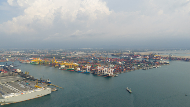 Si Racha District Thailand 08 March 2026 Aerial view of the Laem Chabang International Terminal B 5 Terminal with container ships and industrial cranes along the coast. Si Racha District Thailand 08 March 2026 Aerial view of the Laem Chabang International Terminal B 5 Terminal with container ships and industrial cranes along the coast.