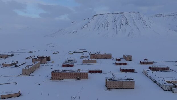 Aerial view of Pyramiden ghost town in the snow Svalbard and Jan Mayen.