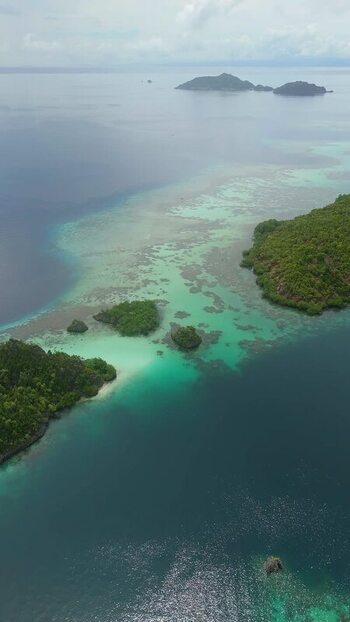 Aerial view of Piaynemo karst islands in Indonesia. Aerial view of Piaynemo karst islands in Indonesia.
