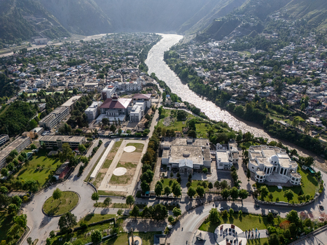 Aerial view of Muzaffarabad city with the Neelum River flowing through the valley surrounded by mountains lush green parks and urban infrastructure in Muzaffarabad Azad Kashmir Pakistan. Aerial view of Muzaffarabad city with the Neelum River flowing through the valley surrounded by mountains lush green parks and urban infrastructure in Muzaffarabad Azad Kashmir Pakistan.