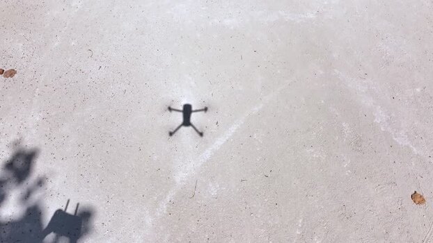 Aerial view of a drone shadow on white sand in Fulhadhoo Maldives. Aerial view of a drone shadow on white sand in Fulhadhoo Maldives.
