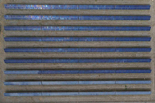 Aerial view of rows of solar panels in a solar farm in Golden Colorado United States.