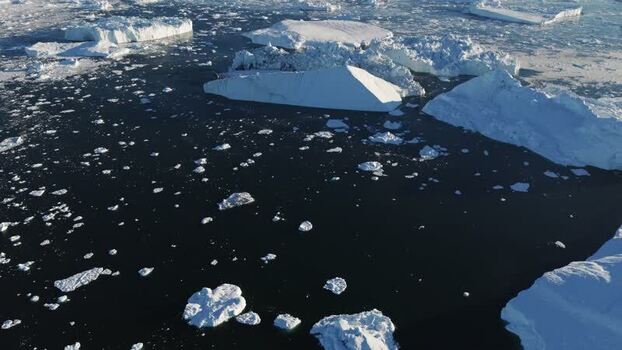 Aerial view of Ilulissat glacier icebergs in Greenland.
