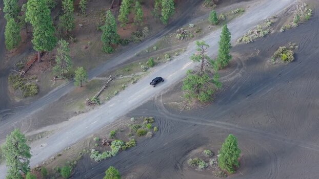 Aerial view of an ATV on a dirt road in Flagstaff United States.