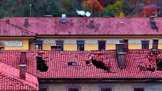 Damaged Red Tiled Roof in Italy