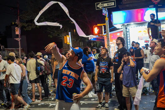 Williamsburg New York USA 14 June 2026 View of basketball fans celebrating in the streets with streamers and New York Knicks jerseys after the NBA Championships. Williamsburg New York USA 14 June 2026 View of basketball fans celebrating in the streets with streamers and New York Knicks jerseys after the NBA Championships.