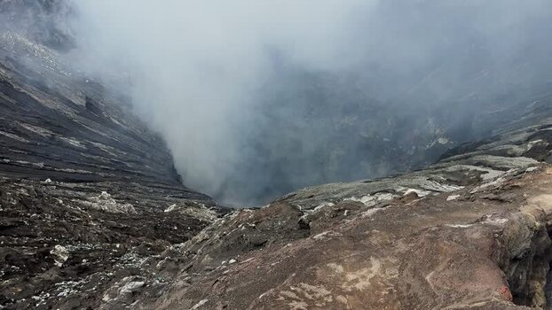 View of the smoking volcanic crater of Bromo Indonesia.