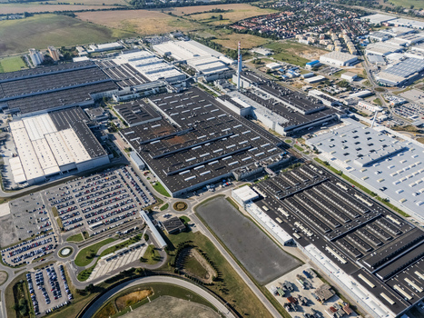 Aerial view of the Volkswagen plant featuring vast industrial buildings and parking lots in Bratislava Bratislavsky kraj Slovakia. Aerial view of the Volkswagen plant featuring vast industrial buildings and parking lots in Bratislava Bratislavsky kraj Slovakia.