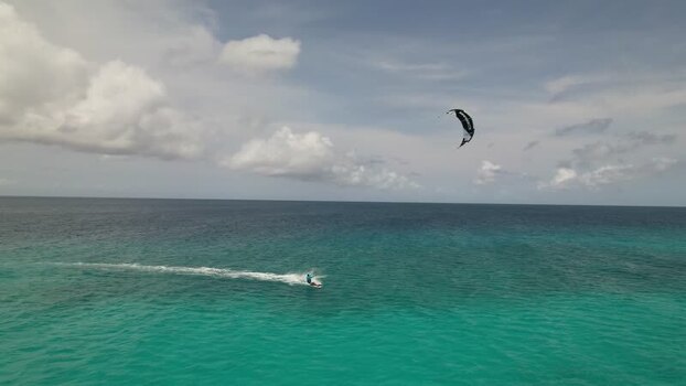 Aerial view of kitesurfer in Los Roques archipelago Venezuela.