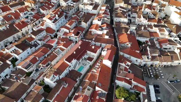 Aerial view of historic Evora rooftops and narrow streets Portugal. Aerial view of historic Evora rooftops and narrow streets Portugal.