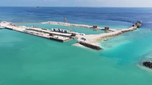 Aerial view of harbor construction in Kudahuvadhoo Maldives. Aerial view of harbor construction in Kudahuvadhoo Maldives.