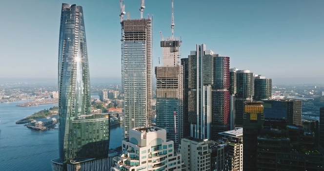 Aerial view of modern skyscrapers and construction cranes in the Sydney skyline Sydney New South Wales Australia. Aerial view of modern skyscrapers and construction cranes in the Sydney skyline Sydney New South Wales Australia.