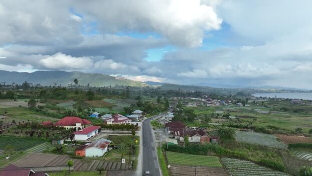 Aerial view of Alahan Panjang and rural fields in Indonesia. Aerial view of Alahan Panjang and rural fields in Indonesia.