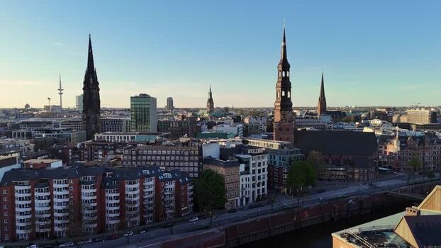 Aerial view of Speicherstadt and church spires in the city skyline Germany. Aerial view of Speicherstadt and church spires in the city skyline Germany.