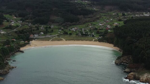 Aerial view of Xillloi Beach and green hills in Vicedo Spain. Aerial view of Xillloi Beach and green hills in Vicedo Spain.