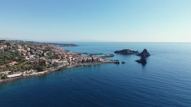 Aerial view of Islands of the Cyclops and Aci Castello Italy.